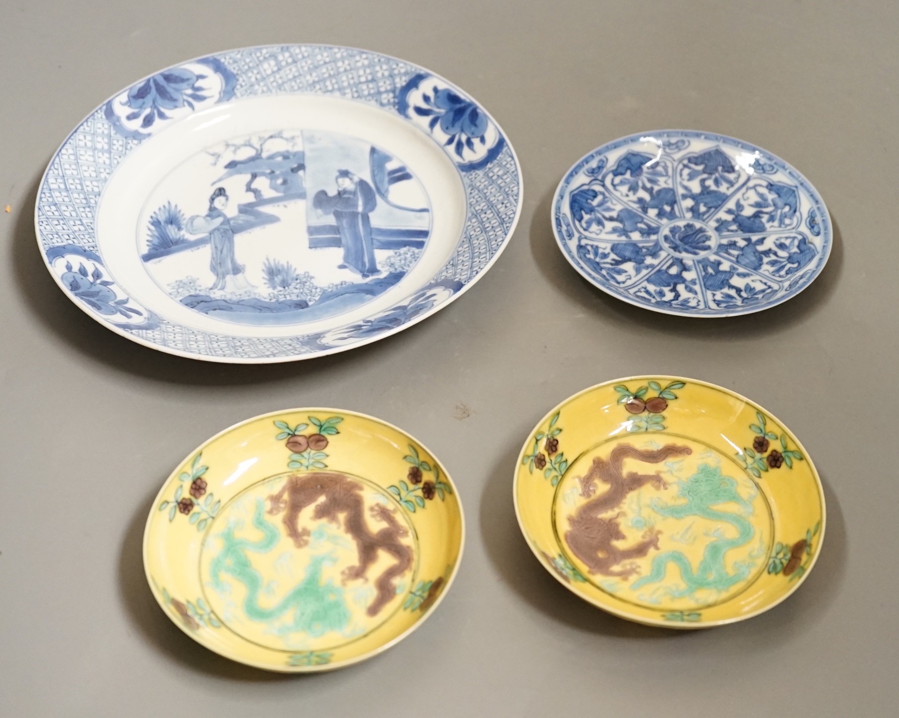 A pair of Chinese dragon dishes, a Kangxi blue and white plate, a Kangxi blue and white dish with chenghua mark